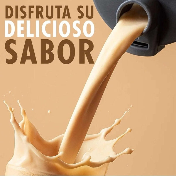 Batido de proteína de vainilla vertiéndose en vaso, salpicaduras cremosas y texto disfrútalo.